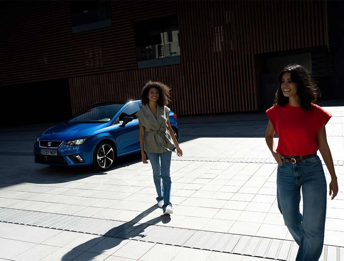 two-girls-getting-walking-away-seat-ibiza-fr