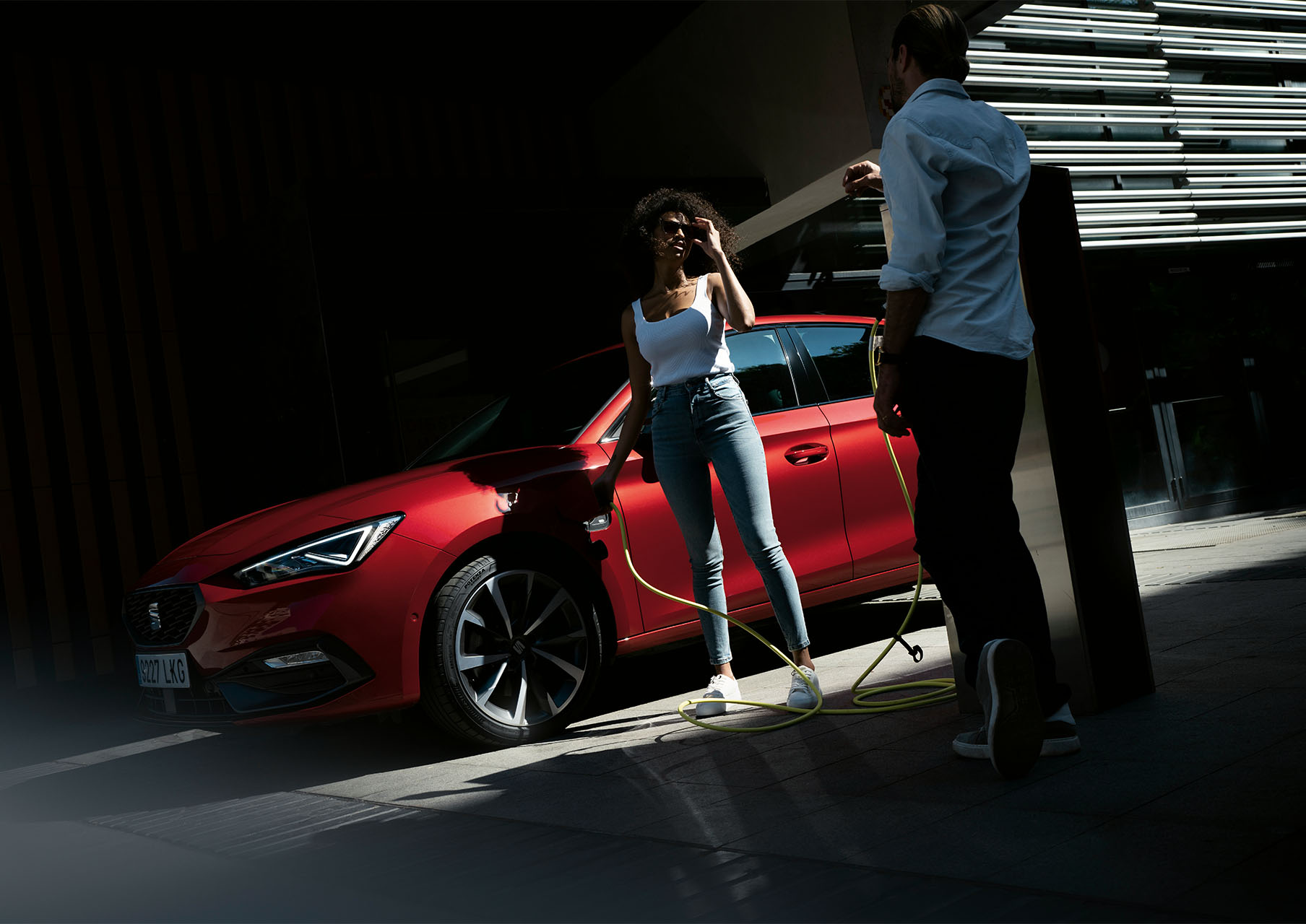 The SEAT Leon 5D FR displayed in a safety demonstration setting. The car is equipped with advanced safety features including adaptive cruise control, lane assist and emergency braking system.